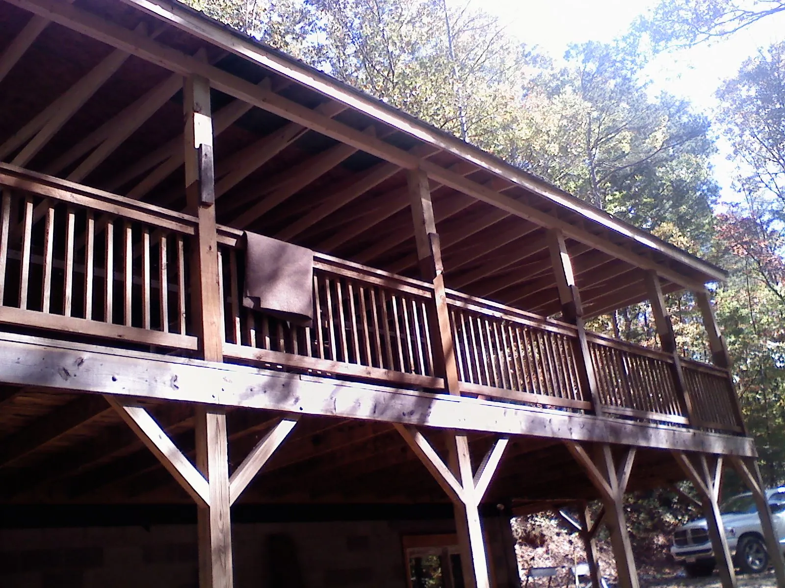 Timber framing under a new elevated porch and deck — Roof Leak Repair in Fruita by Roofing Brothers